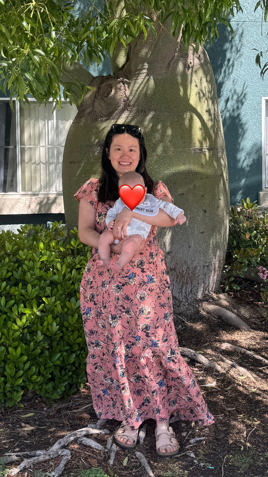 First-time Christian mom holding her four-month-old son, celebrating faith, motherhood, and God's blessings