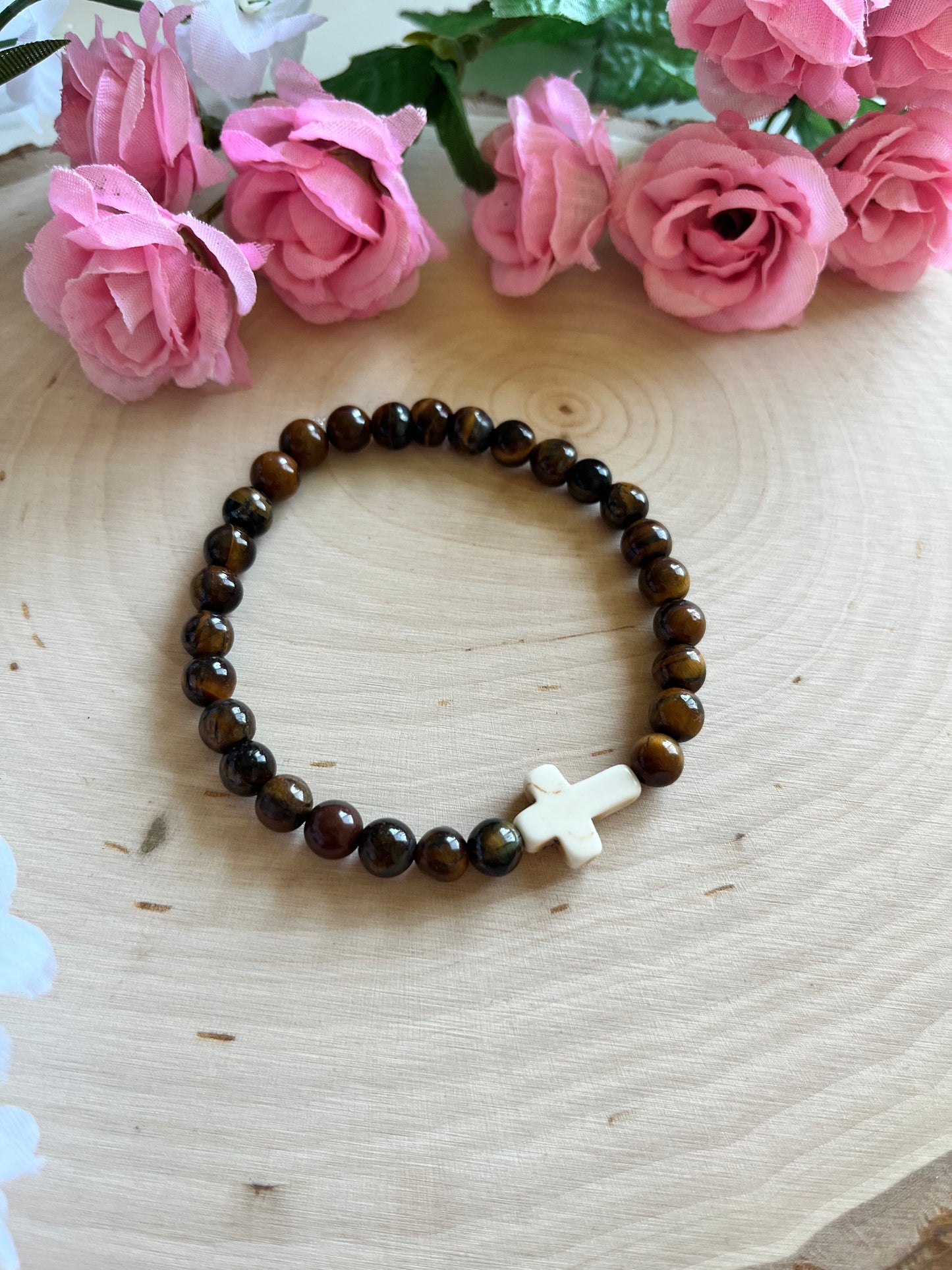 Tiger’s Eye cross bracelet with natural stone beads and faith-inspired design on stretch cord