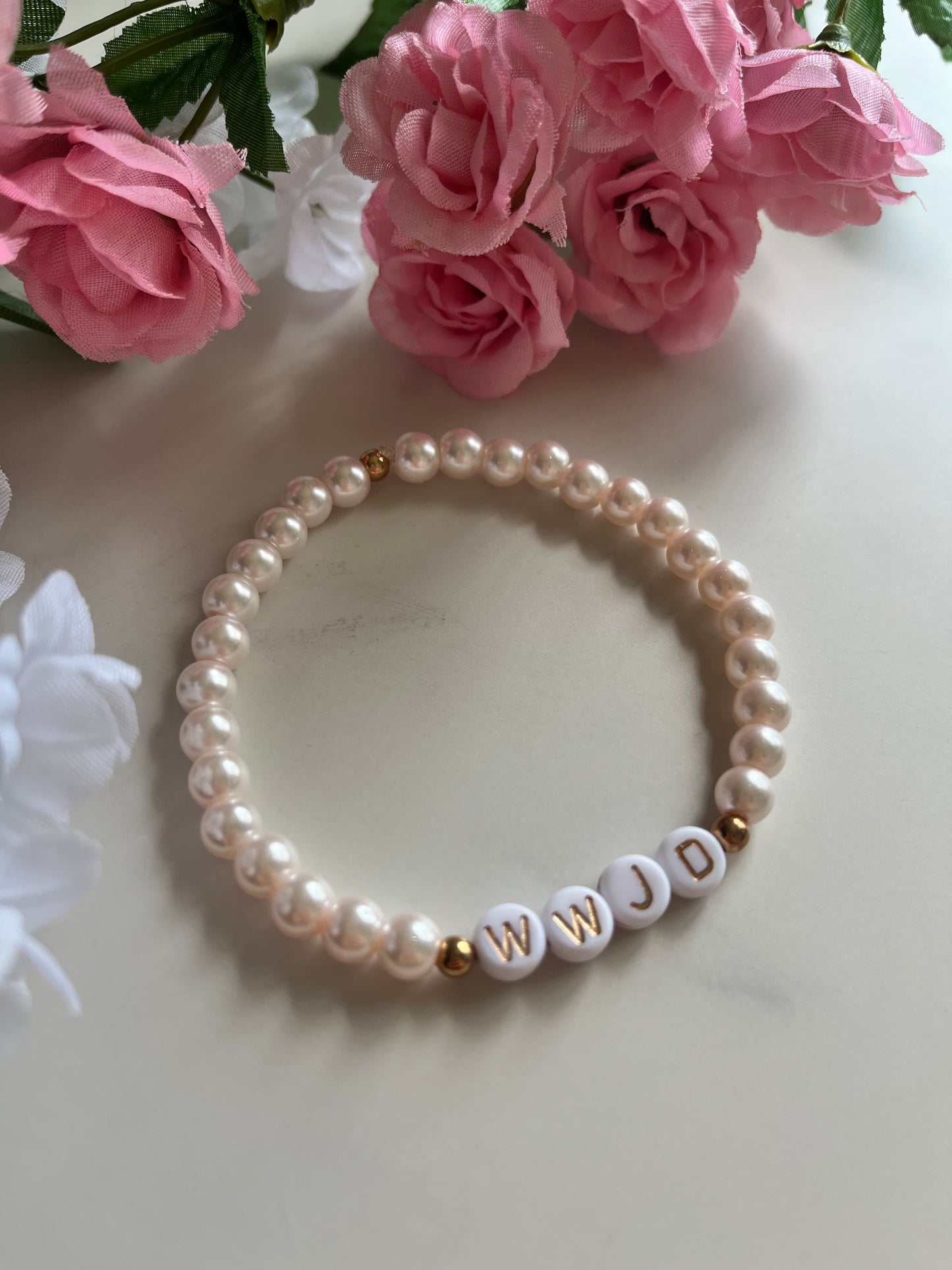 Pearl pink WWJD bracelet – Christian beaded jewelry