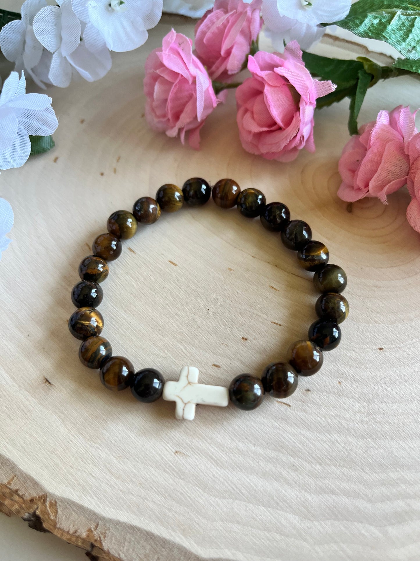 Tiger’s Eye cross bracelet with natural stone beads and faith-inspired design on stretch cord