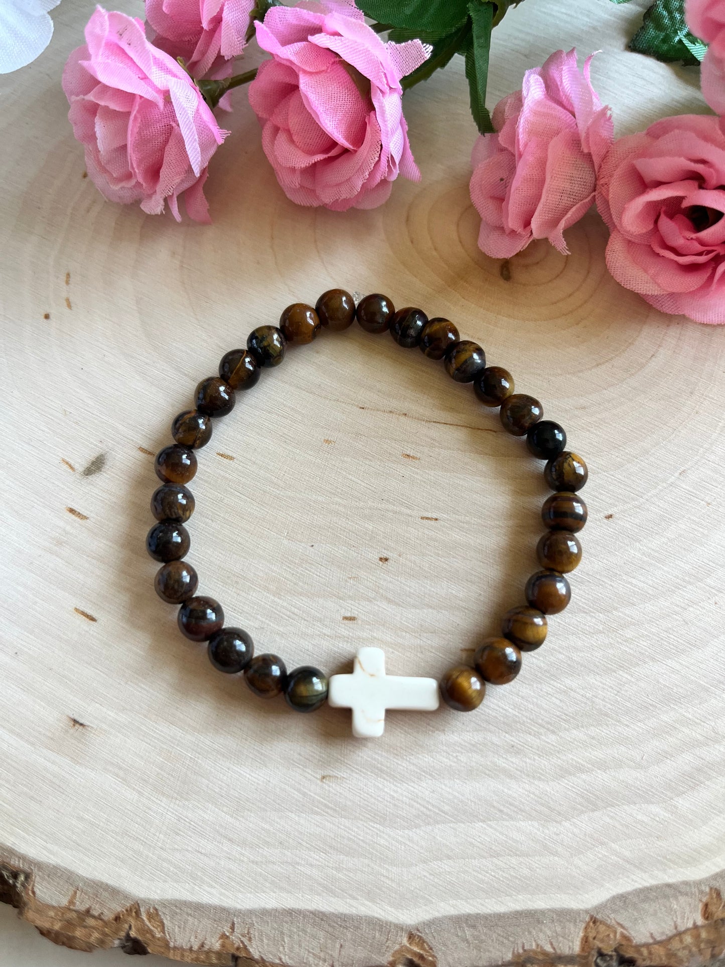 Tiger’s Eye cross bracelet with natural stone beads and faith-inspired design on stretch cord