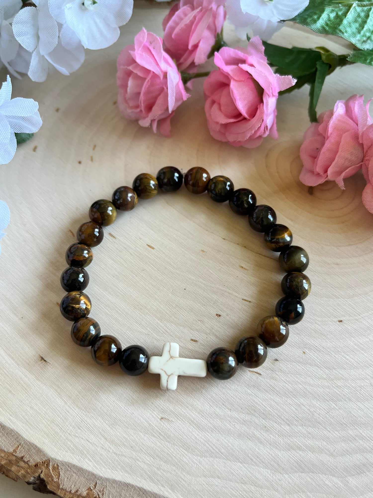 Tiger’s Eye cross bracelet with natural stone beads and faith-inspired design on stretch cord