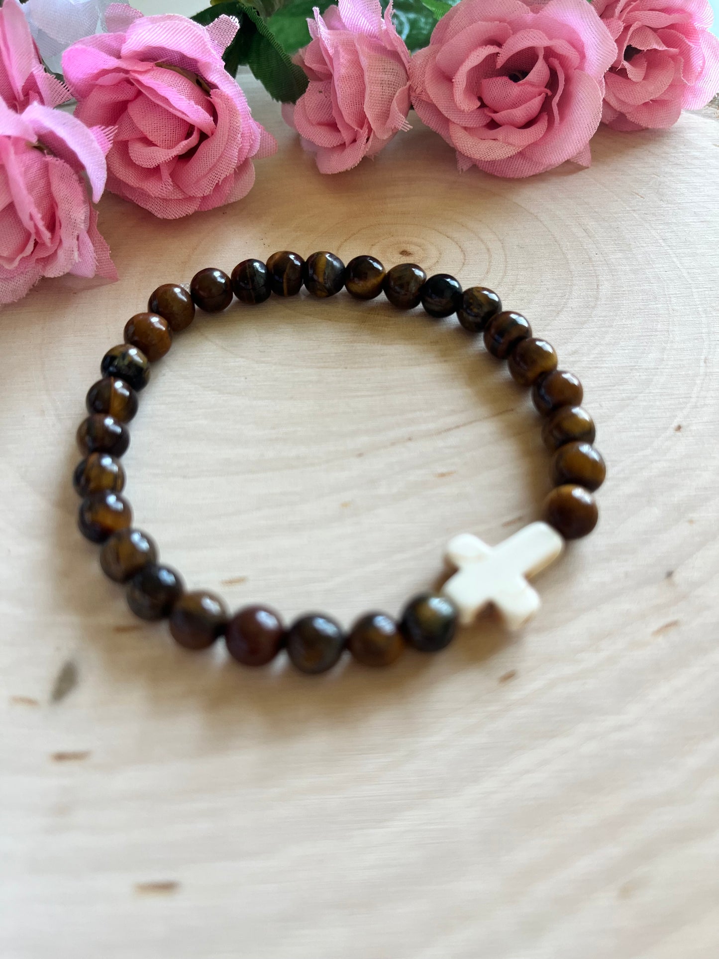 Tiger’s Eye cross bracelet with natural stone beads and faith-inspired design on stretch cord
