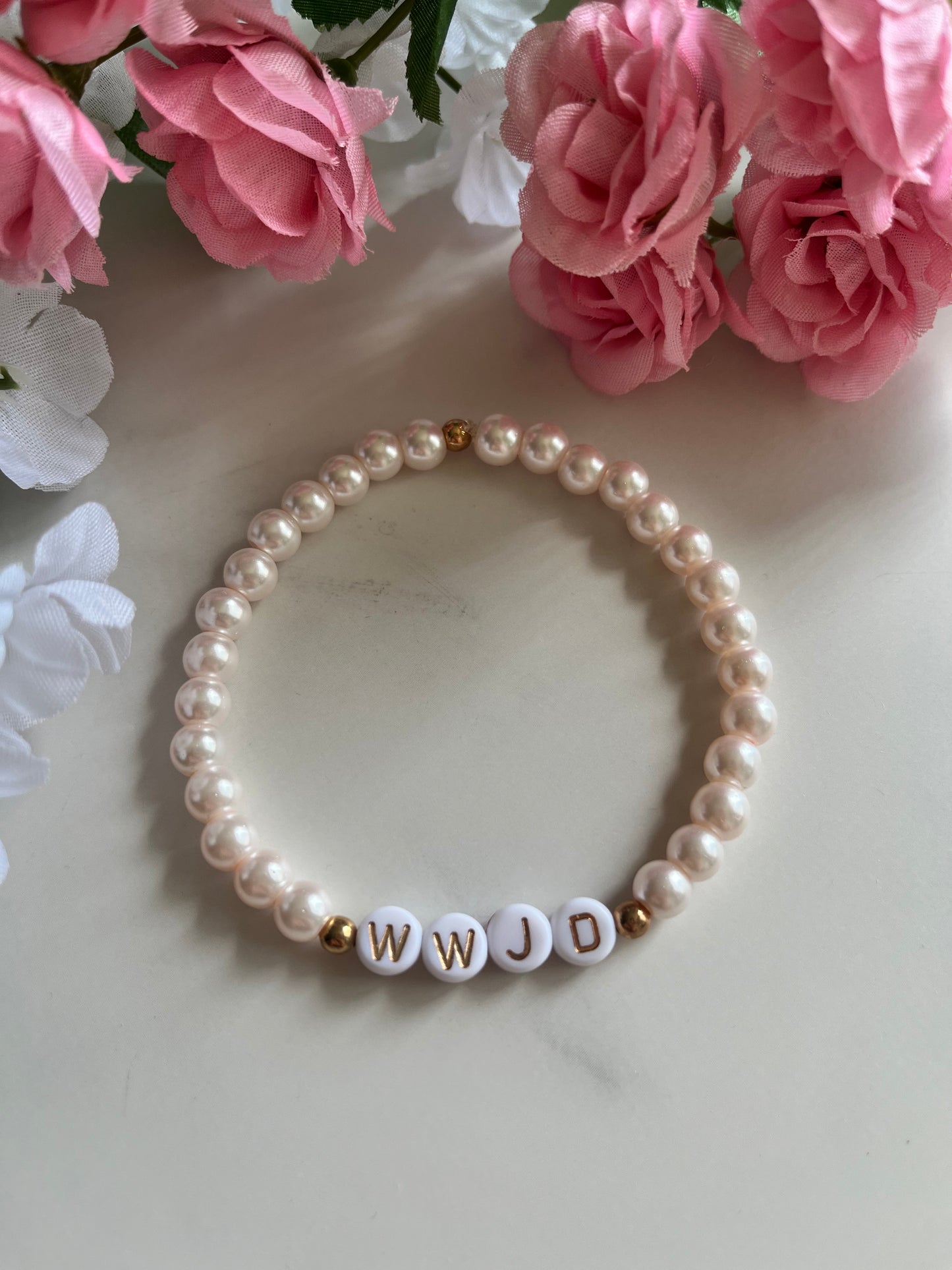 Pearl pink WWJD bracelet – Christian beaded jewelry