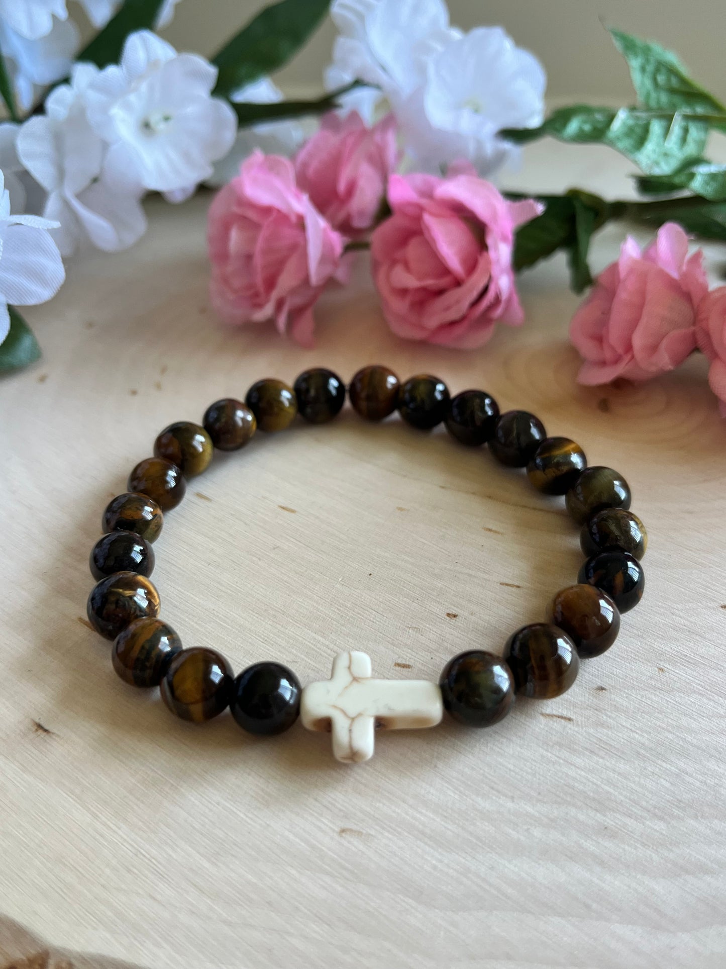 Tiger’s Eye cross bracelet with natural stone beads and faith-inspired design on stretch cord