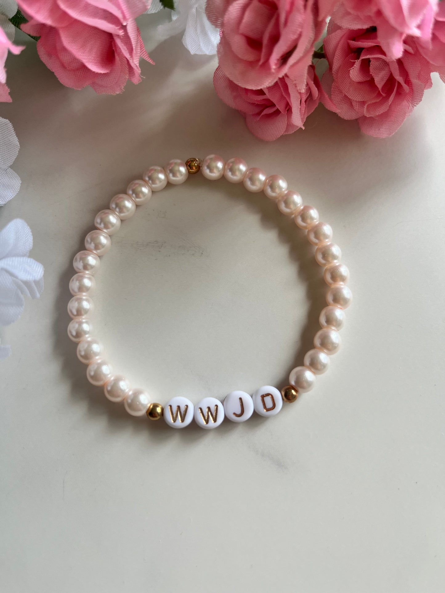 Pearl pink WWJD bracelet – Christian beaded jewelry