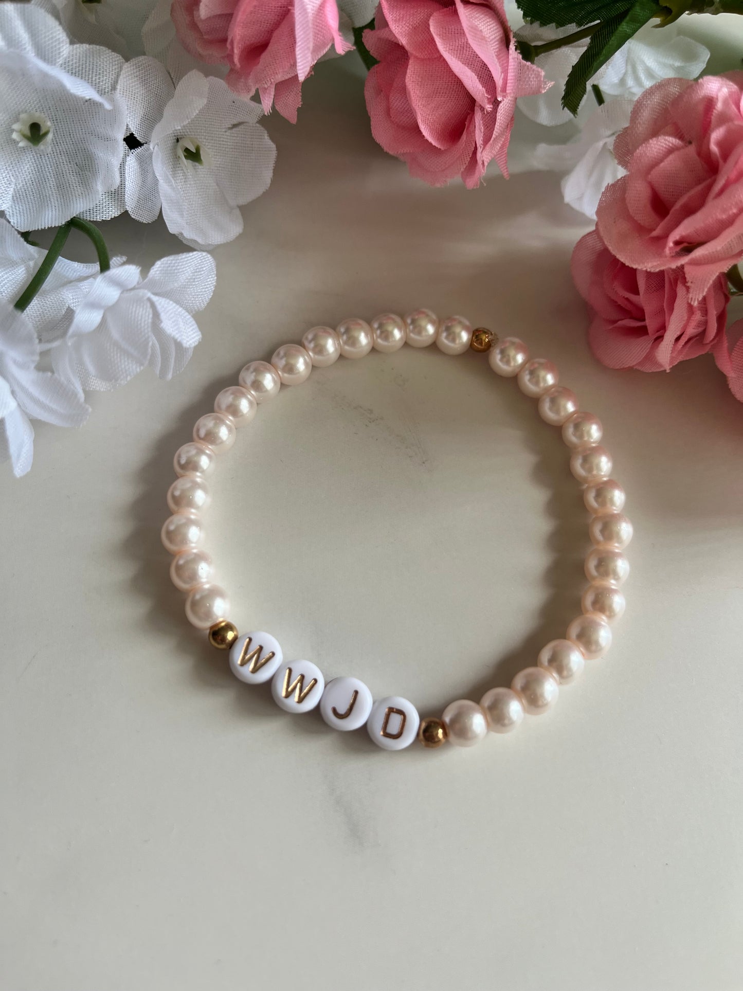 Pearl pink WWJD bracelet – Christian beaded jewelry