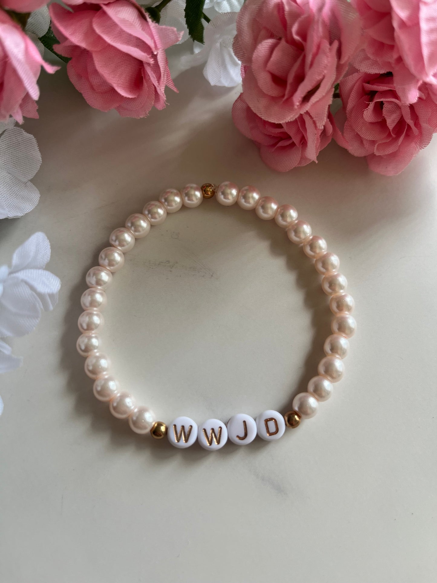 Pearl pink WWJD bracelet – Christian beaded jewelry
