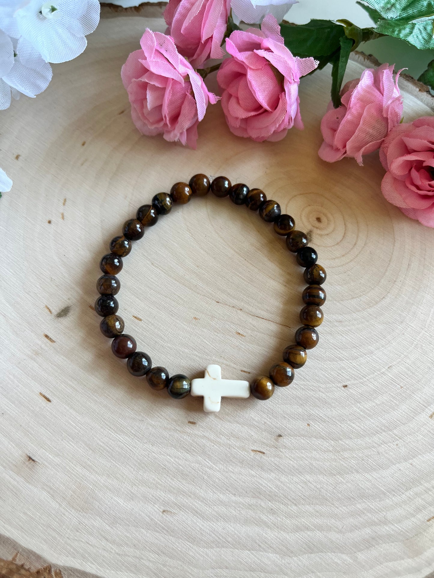 Tiger’s Eye cross bracelet with natural stone beads and faith-inspired design on stretch cord