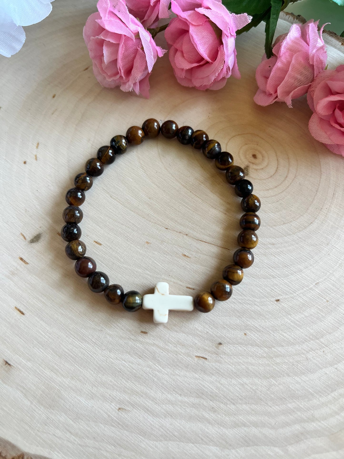 Tiger’s Eye cross bracelet with natural stone beads and faith-inspired design on stretch cord