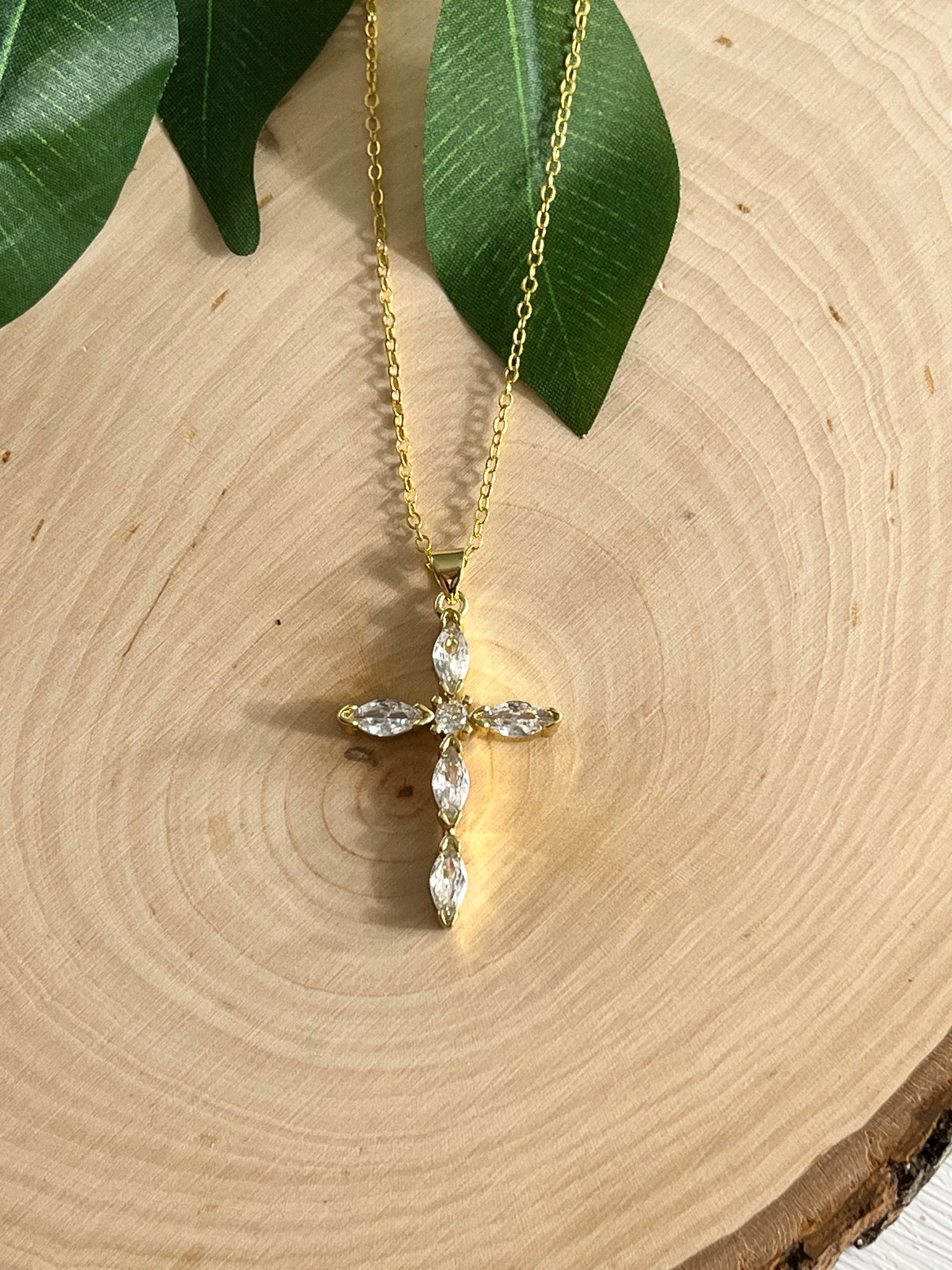 Handmade Christian necklaces collection with cross, heart, and daisy pendants in 16K gold and sterling silver. Elegant faith jewelry for spiritual devotion.