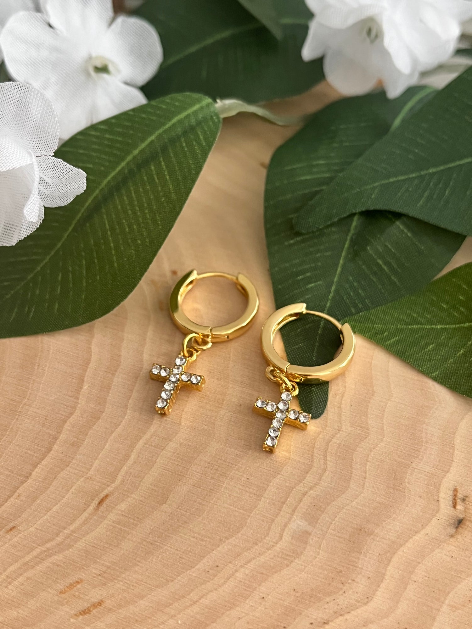 Handcrafted earring collection featuring elegant, faith-inspired designs in 16K and 18K gold, sterling silver, and pearl. Perfect for expressing personal style with spiritual meaning.