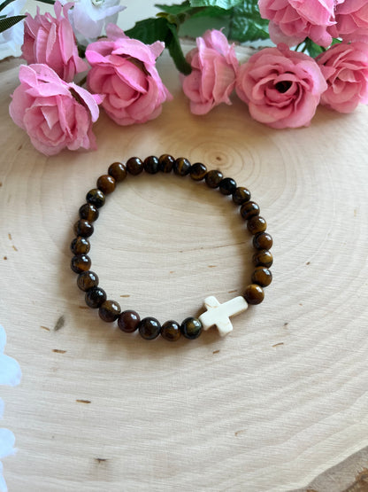 Tiger’s Eye cross bracelet with natural stone beads and faith-inspired design on stretch cord

