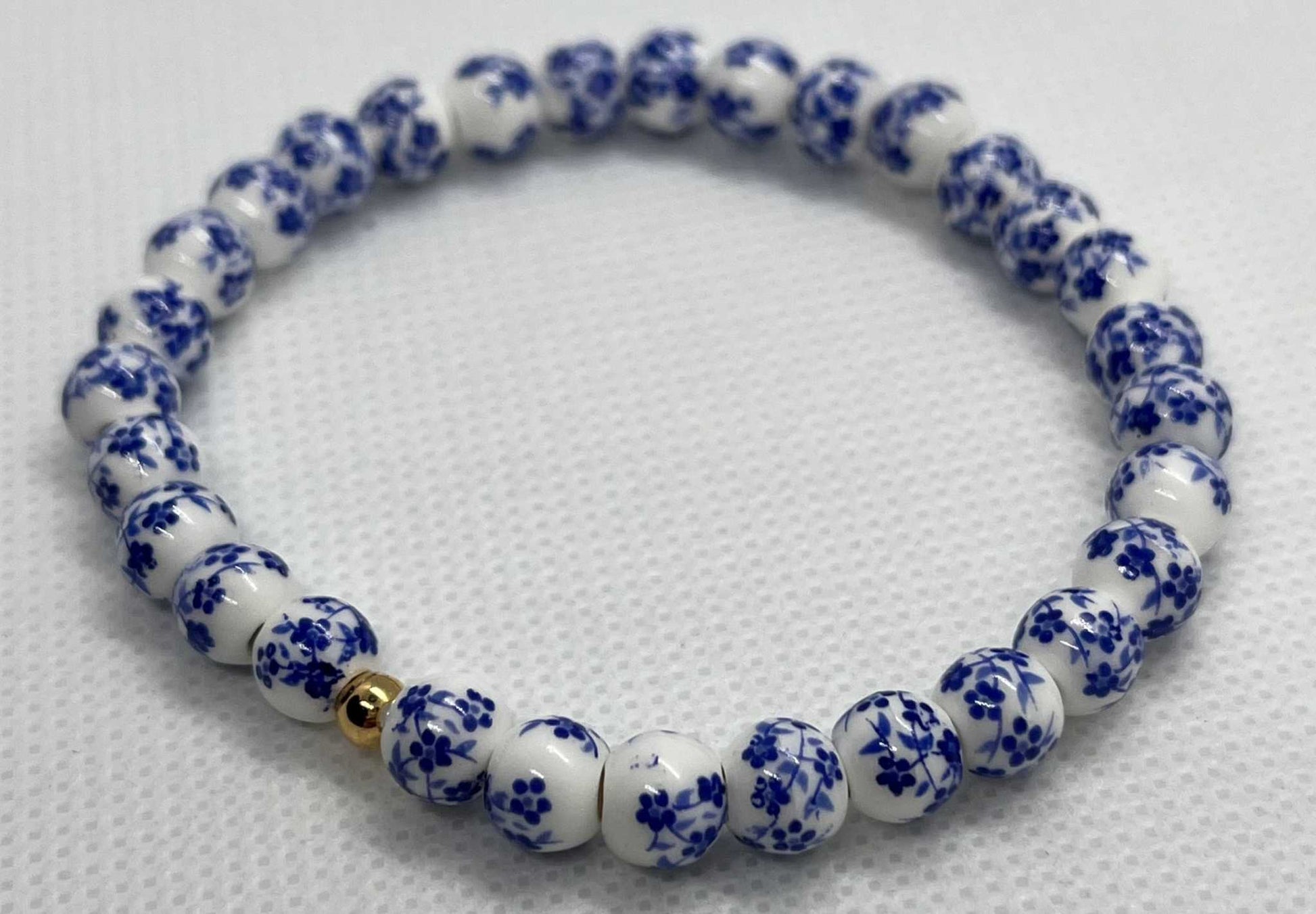 Beaded Bracelet with blue floral beads and stretchy fit, perfect for everyday wear

