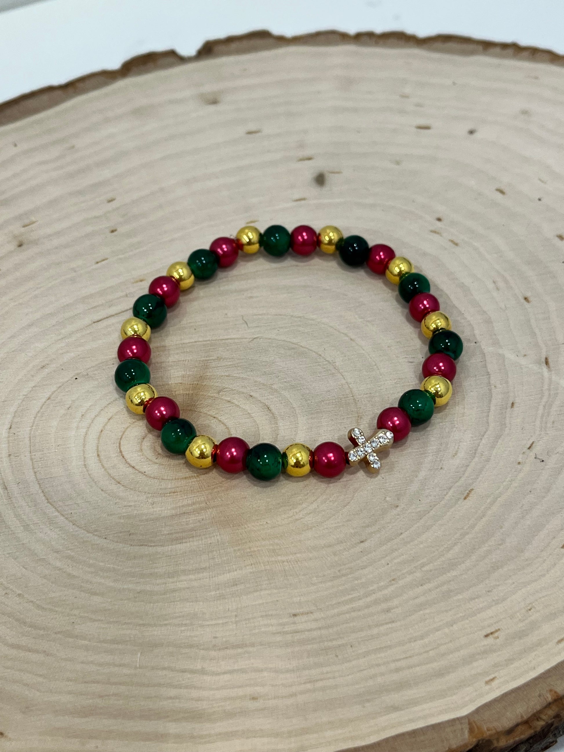 Gold beaded Christmas cross bracelet with jeweled cross charm