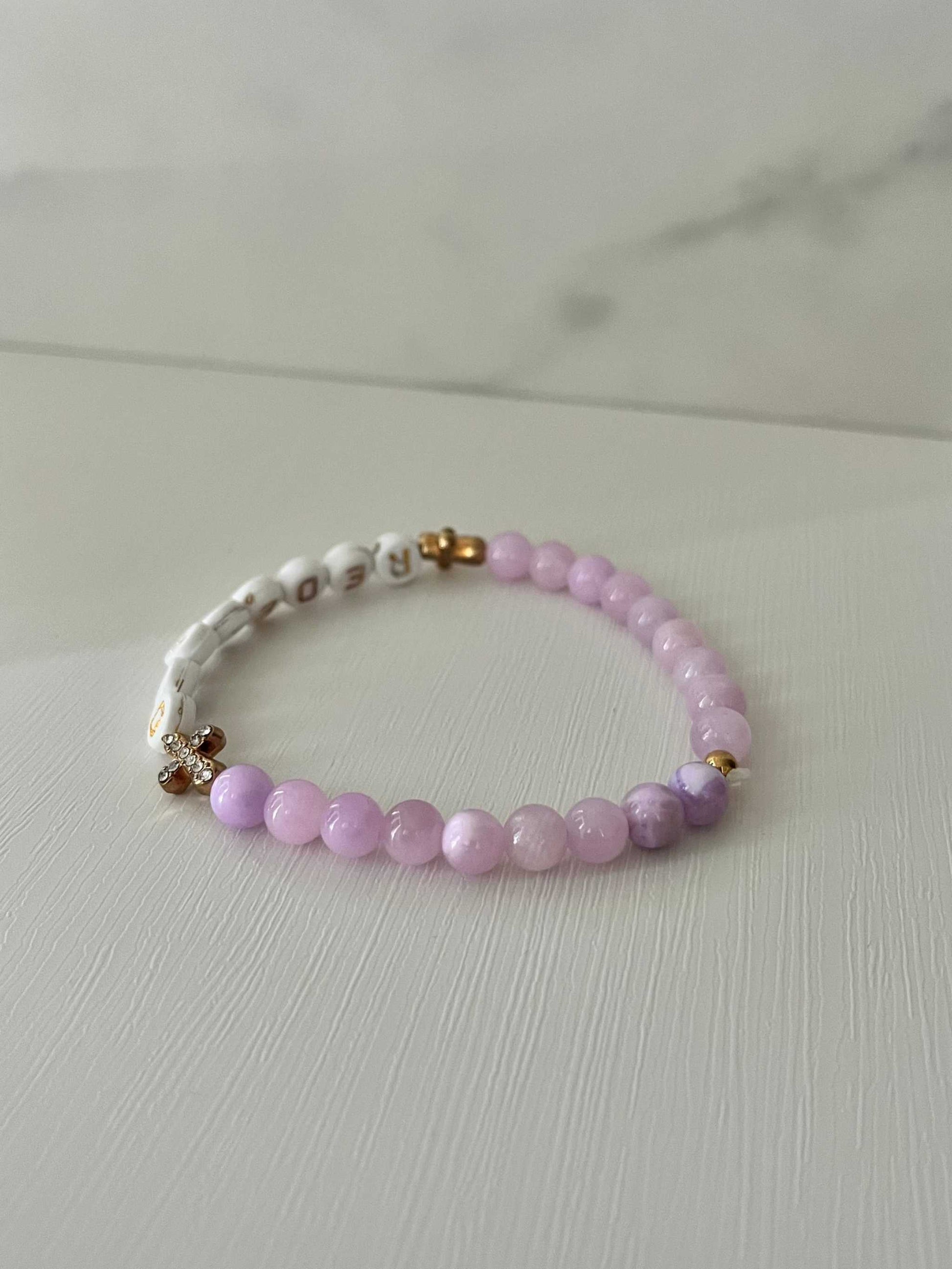 Redeemed Lavender Bead Bracelet – elegant faith jewelry with lavender glass stones.

