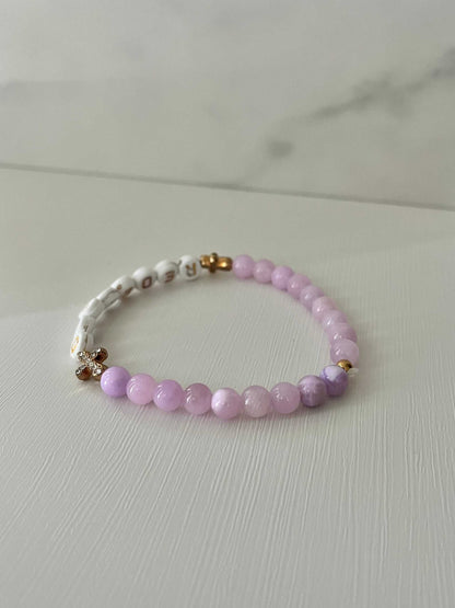 Redeemed Lavender Bead Bracelet – elegant faith jewelry with lavender glass stones.

