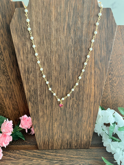 Gold heart necklace with freshwater pearl and 18K gold heart pendant on 18-inch hypoallergenic chain