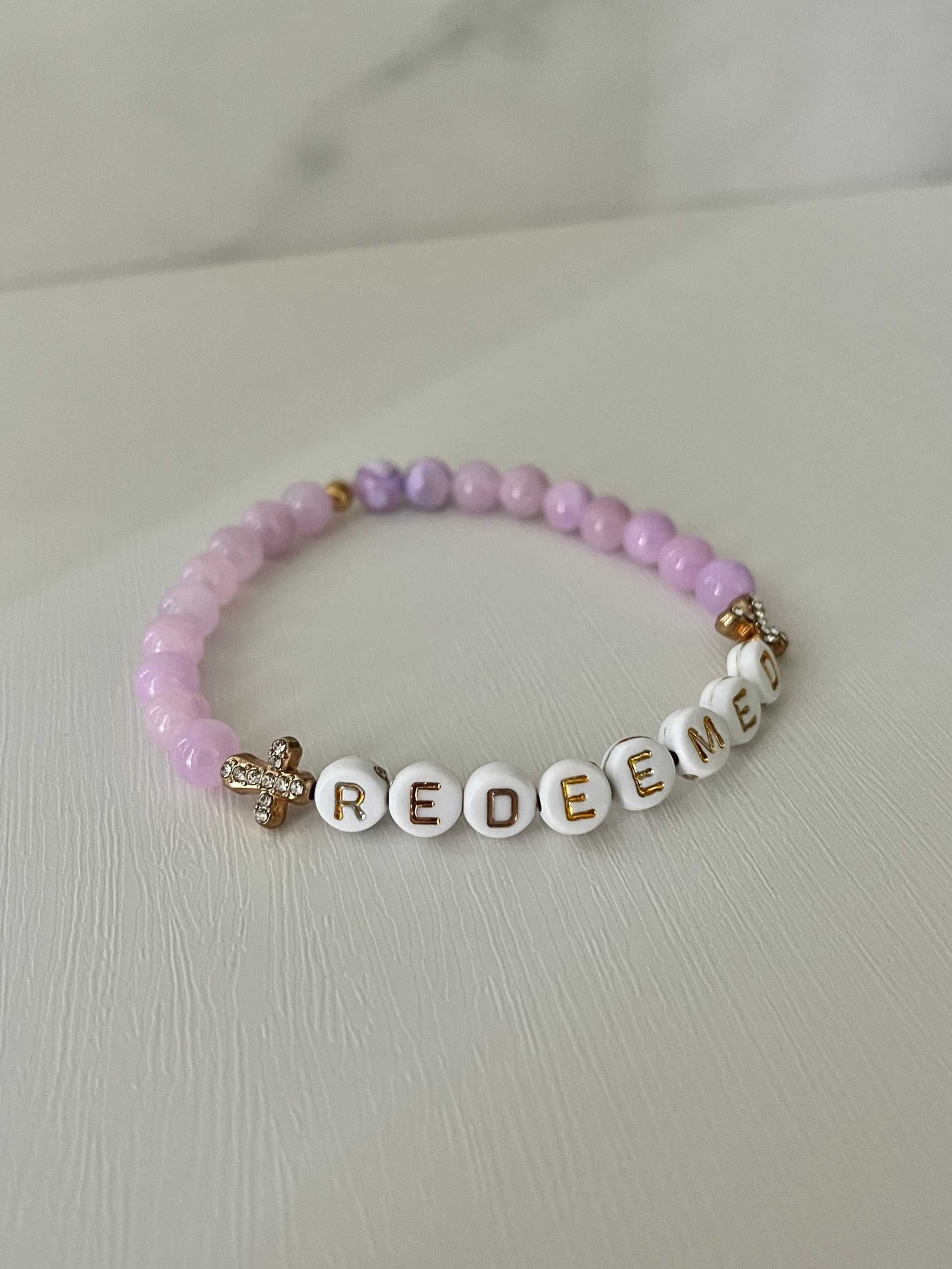 Redeemed Lavender Bead Bracelet – elegant faith jewelry with lavender glass stones.

