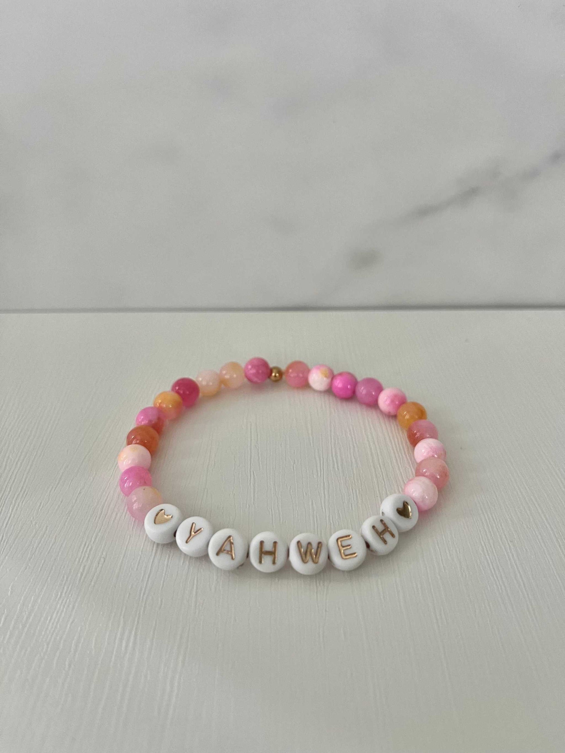 YAHWEH Pink Purple Marble Bracelet showcasing vibrant marble stones, ideal for expressing faith and adding a colorful touch to your jewelry collection.