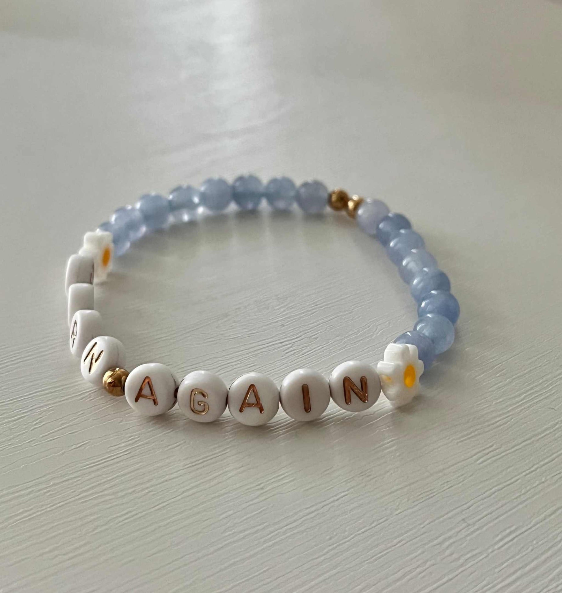 Sky Blue Born Again Bracelet showcasing vibrant blue beads, ideal for expressing faith and celebrating new beginnings in your spiritual journey.