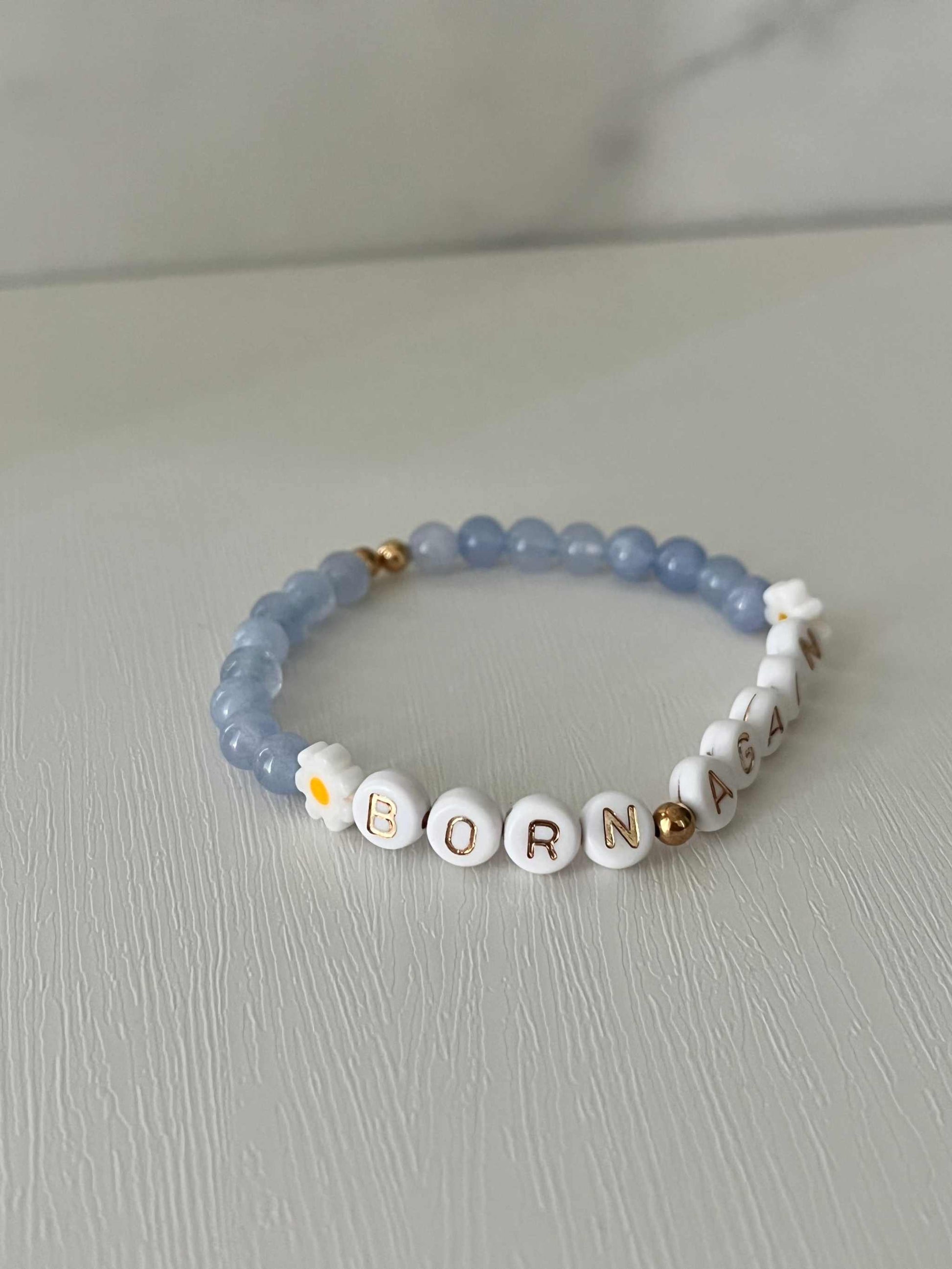 Sky Blue Born Again Bracelet showcasing vibrant blue beads, ideal for expressing faith and celebrating new beginnings in your spiritual journey.