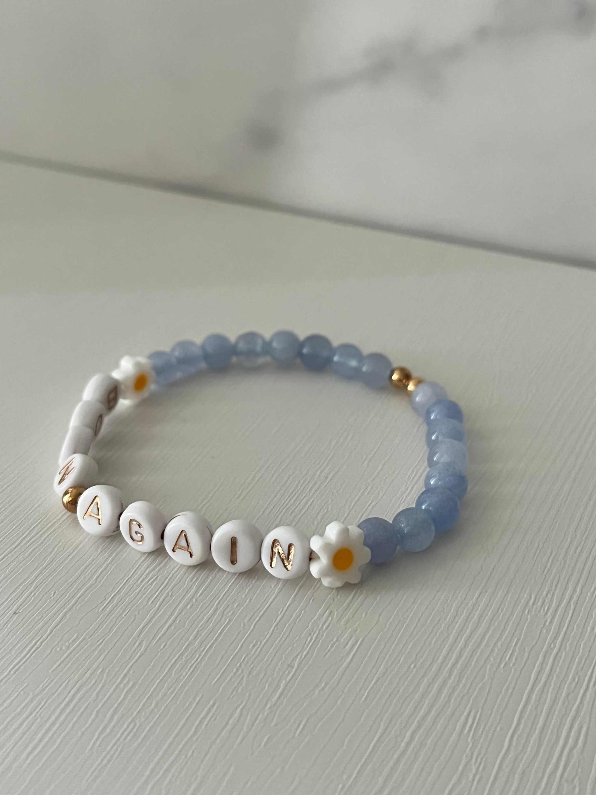 Sky Blue Born Again Bracelet showcasing vibrant blue beads, ideal for expressing faith and celebrating new beginnings in your spiritual journey.