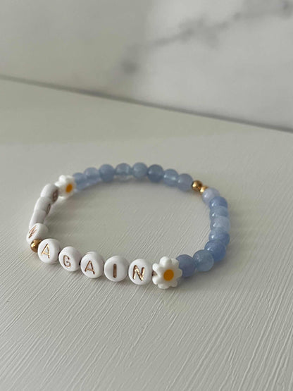 Sky Blue Born Again Bracelet showcasing vibrant blue beads, ideal for expressing faith and celebrating new beginnings in your spiritual journey.