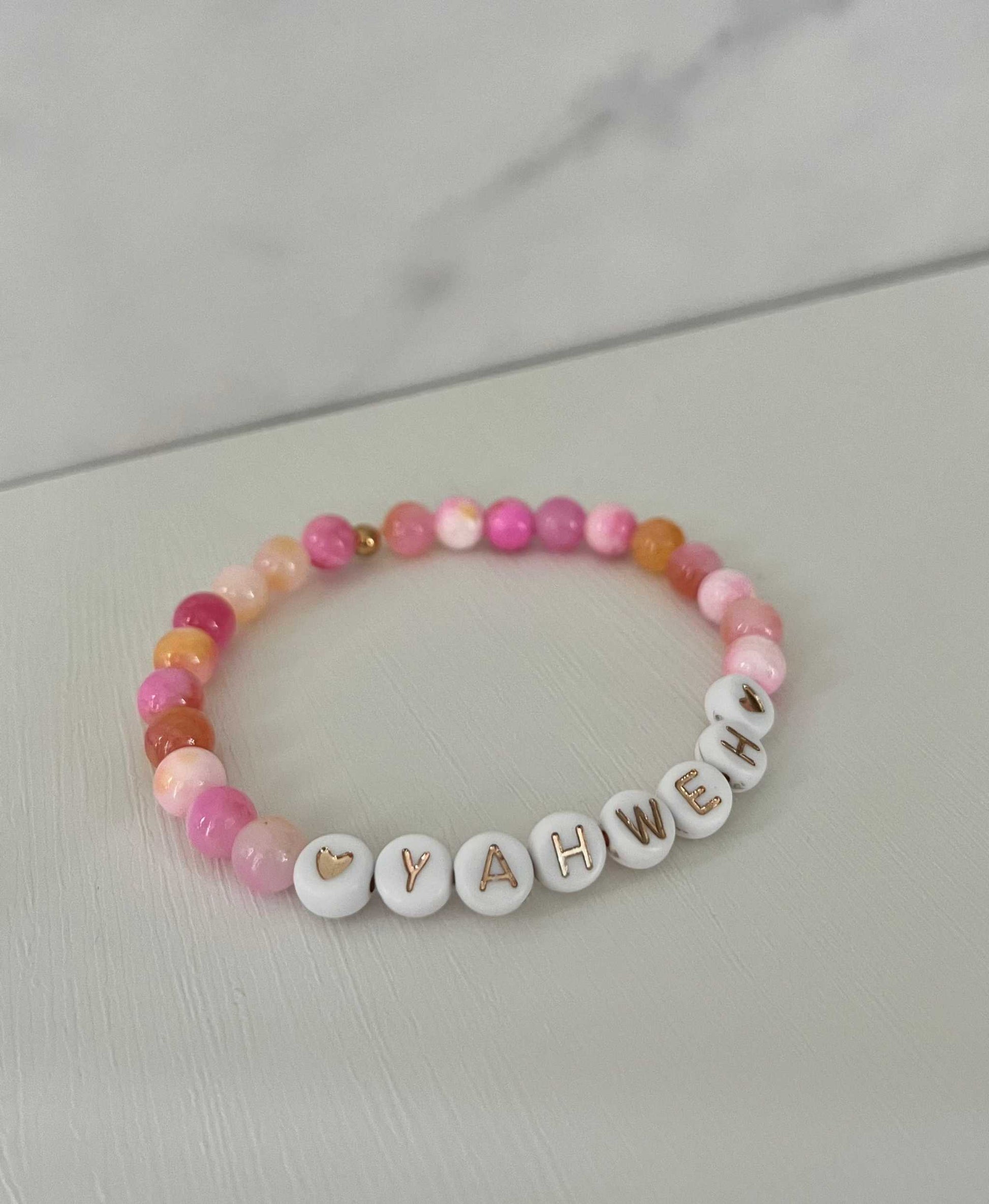 YAHWEH Pink Purple Marble Bracelet showcasing vibrant marble stones, ideal for expressing faith and adding a colorful touch to your jewelry collection.