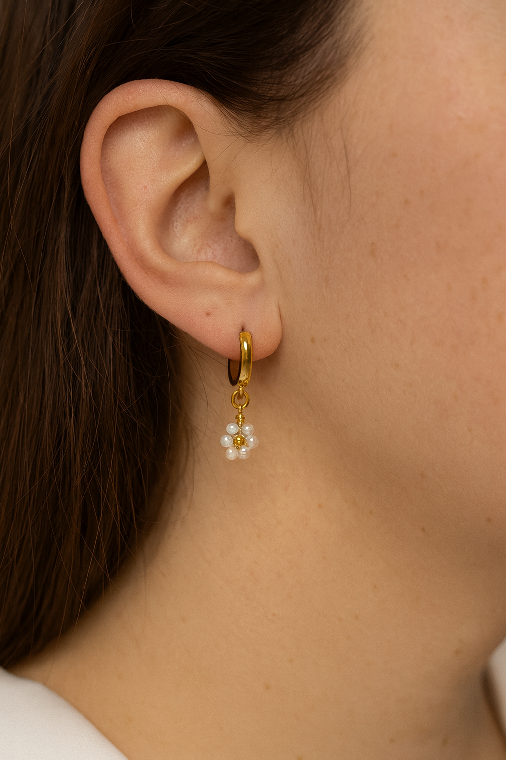 Gold floral huggie earrings with anti-tarnish finish – faith-inspired Christian jewelry
