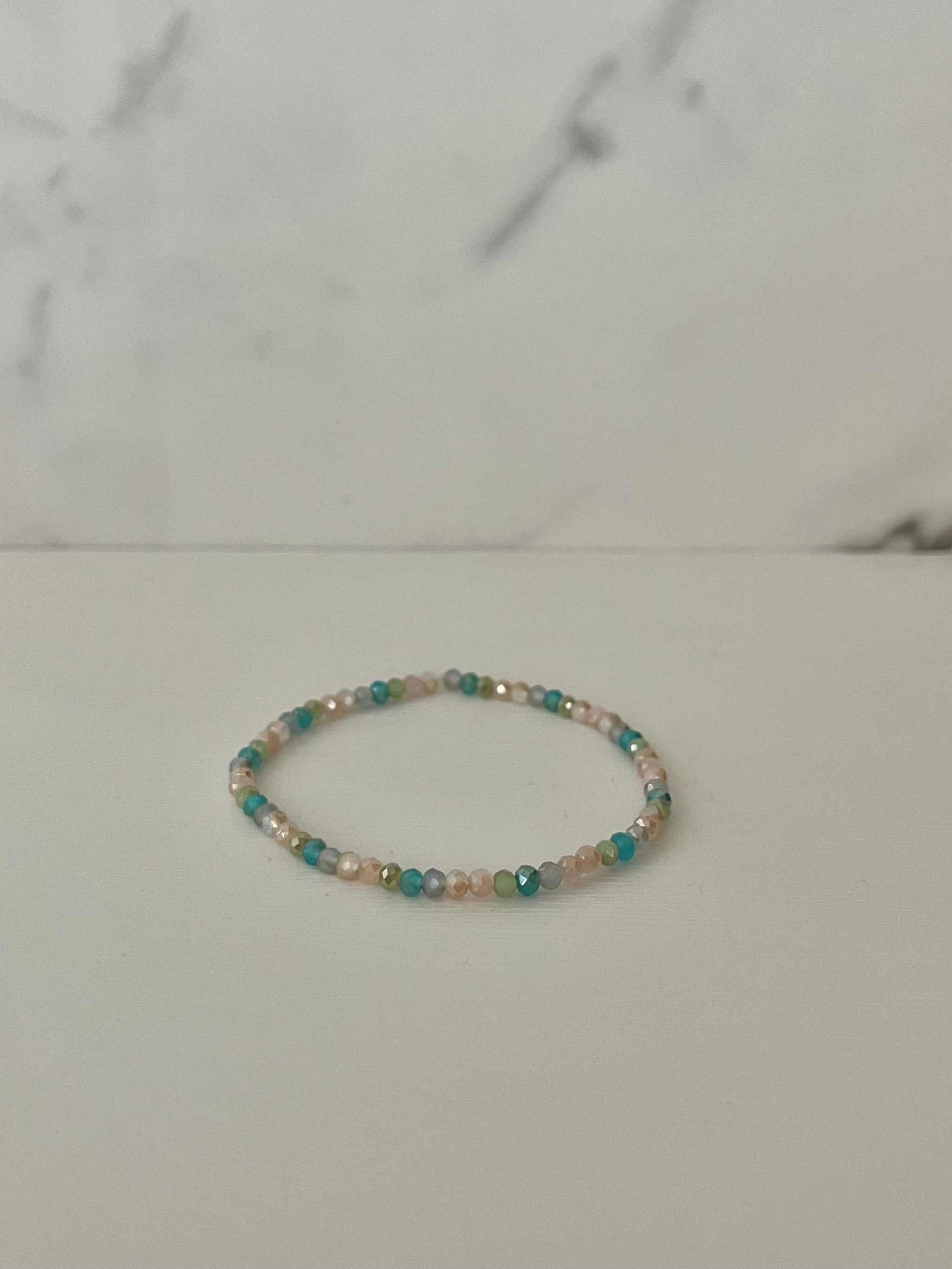 Multicolored jeweled bMulticolor Jeweled Beaded Bracelet featuring vibrant beads, perfect for adding a colorful touch to your jewelry collection.eaded bracelet