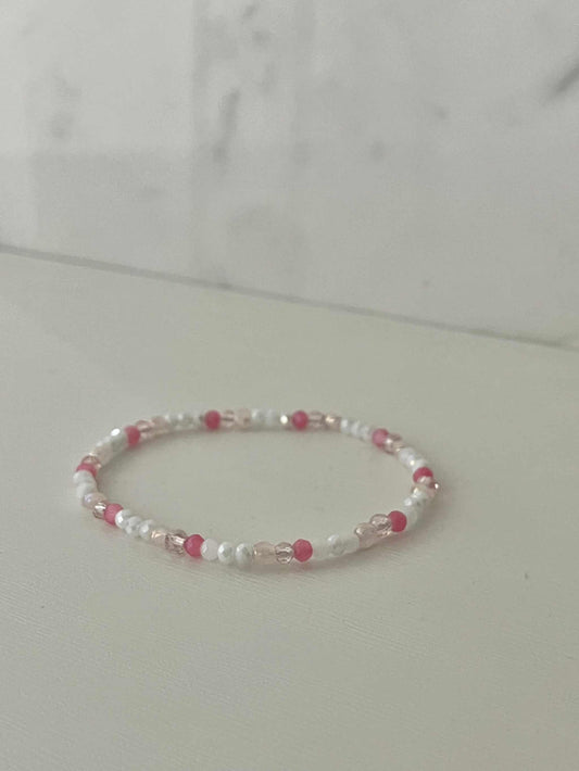 Dainty pink white jeweled crystal bracePink White Crystal Dainty Bracelet featuring delicate jeweled crystals, perfect for adding a touch of elegance to any outfit.let