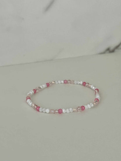 Dainty pink white jeweled crystal bracPink White Crystal Dainty Bracelet featuring delicate jeweled crystals, perfect for adding a touch of elegance to any outfit.elet