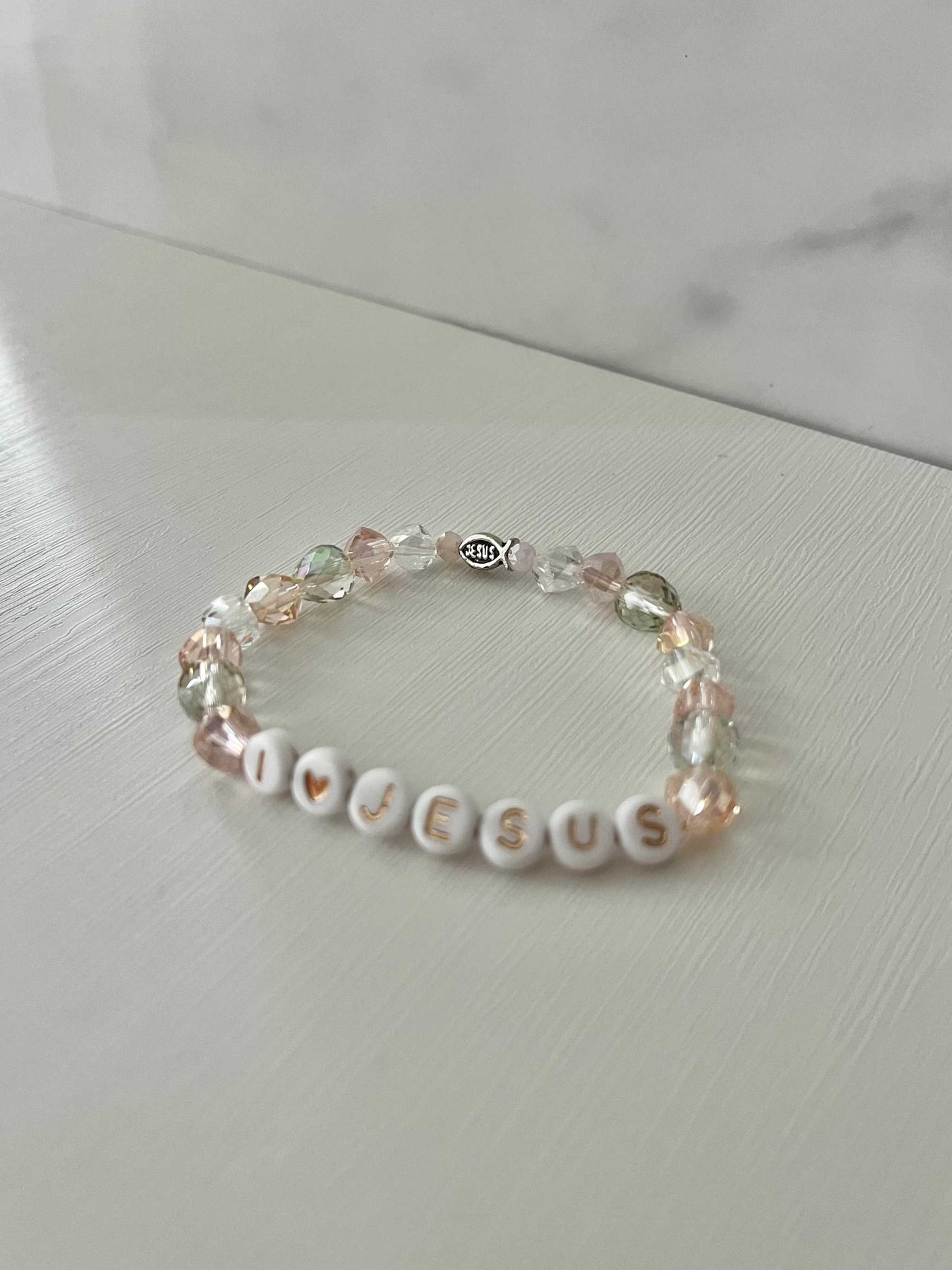 I love Jesus crystal jeweled beadeI Love Jesus Crystal Bracelet featuring vibrant crystal beads, ideal for expressing faith and style.d bracelet