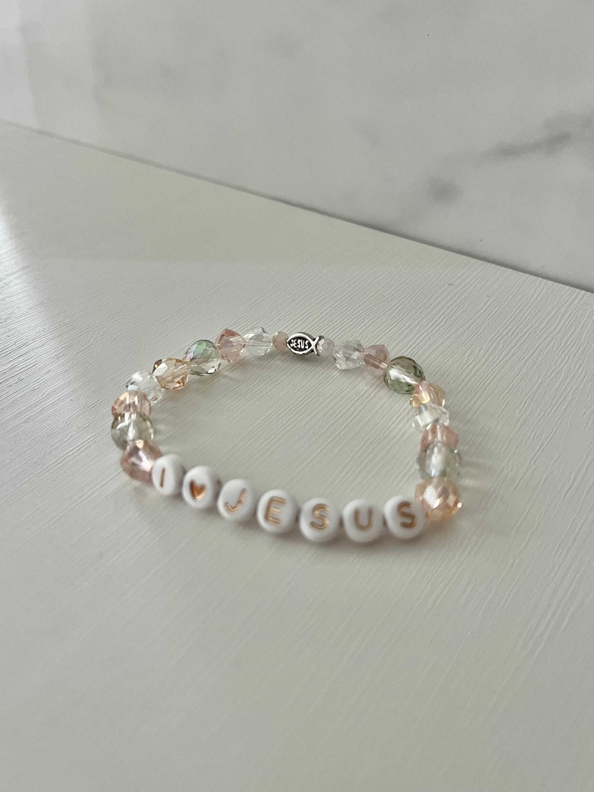 I love Jesus crystal jeweled beadeI Love Jesus Crystal Bracelet featuring vibrant crystal beads, ideal for expressing faith and style.d bracelet