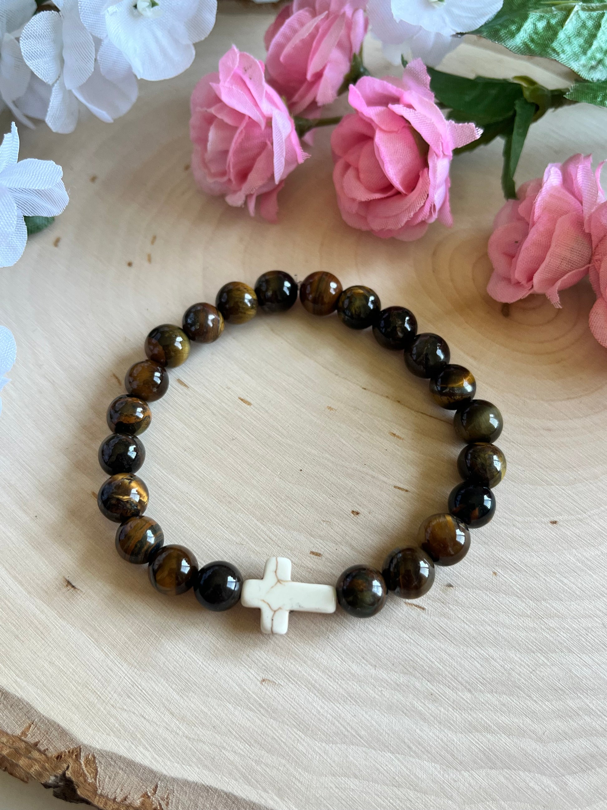 Tiger’s Eye cross bracelet with natural stone beads and faith-inspired design on stretch cord

