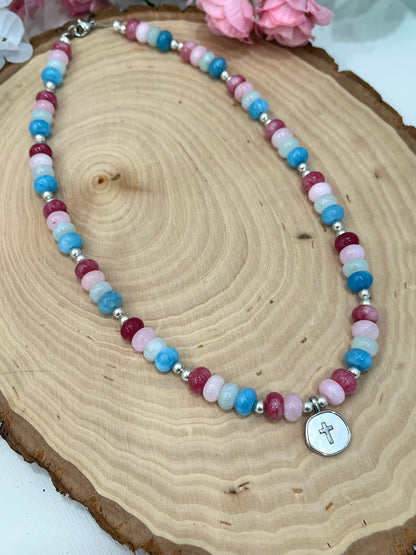 Christian cross necklace with colorful stone beads, silver accents, and pearlescent cross charm