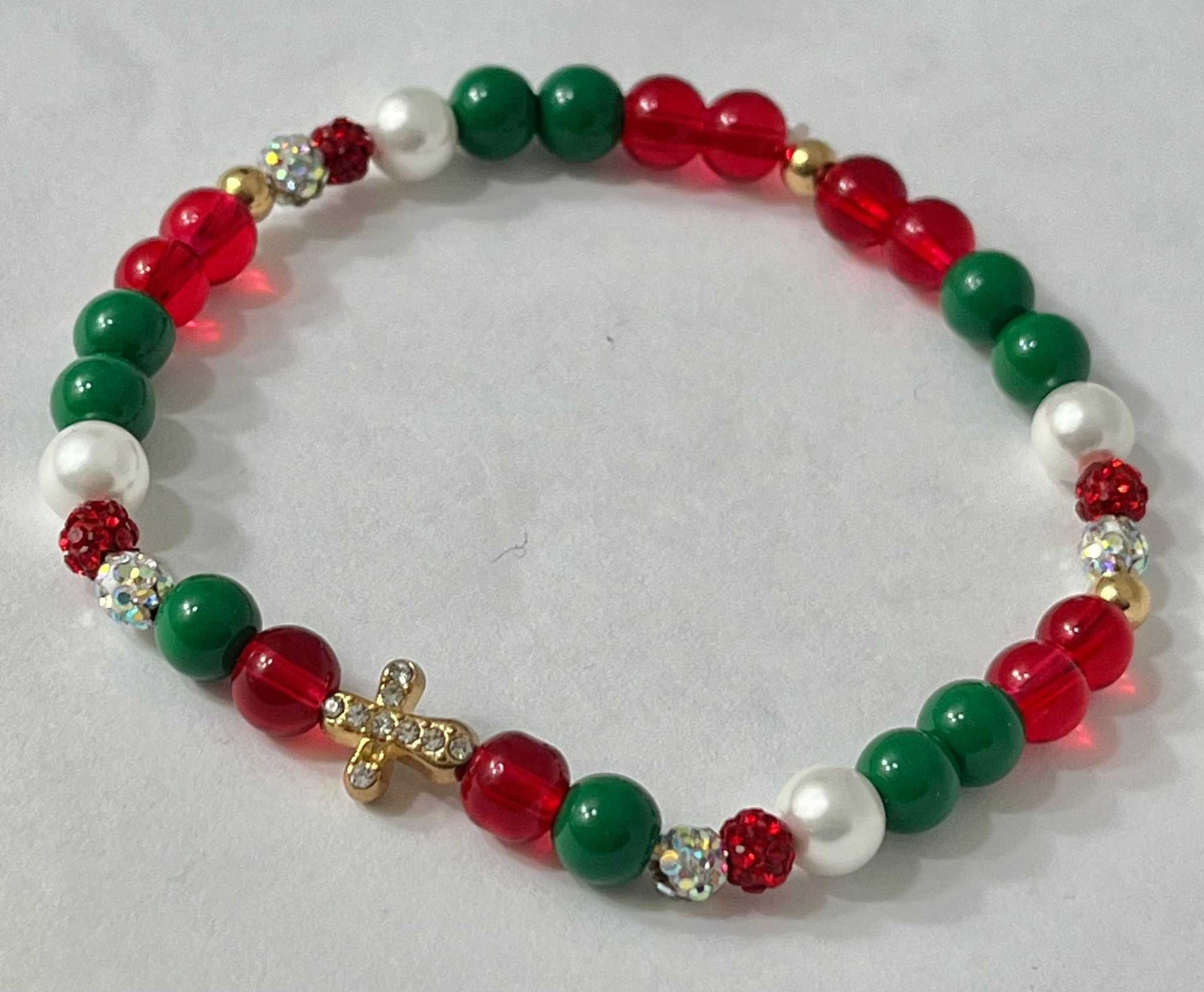 Jeweled Christmas Gold Cross bead bracelet – festive Christian holiday jewelry.

