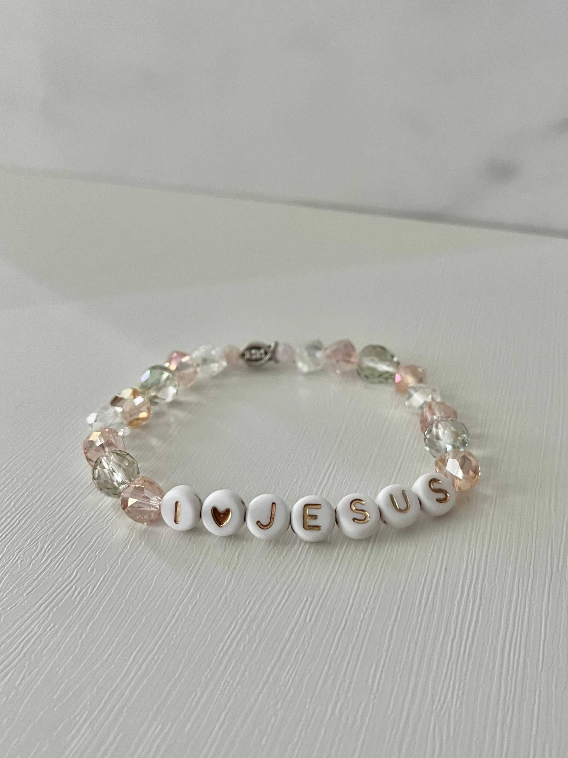 I love Jesus crystal jeweled beaded bI Love Jesus Crystal Bracelet featuring vibrant crystal beads, ideal for expressing faith and style.racelet