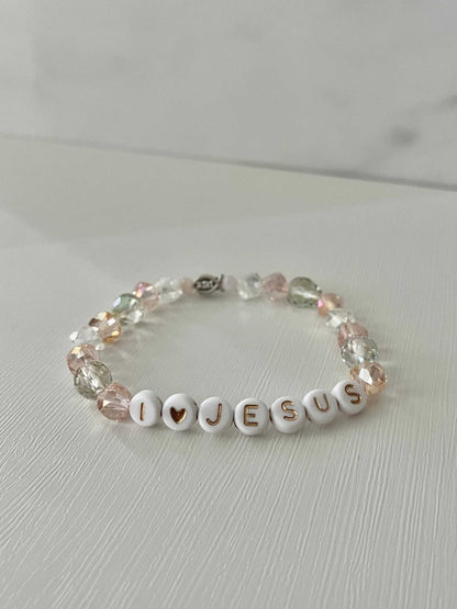 I love Jesus crystal jeweled beaded bI Love Jesus Crystal Bracelet featuring vibrant crystal beads, ideal for expressing faith and style.racelet