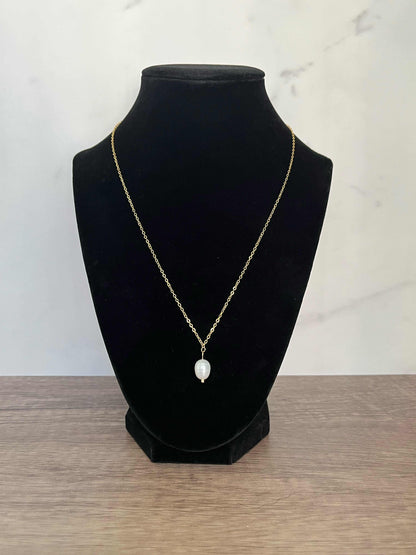 Gold necklace with pearl pendant, inspired by Proverbs 31 for Christian women.