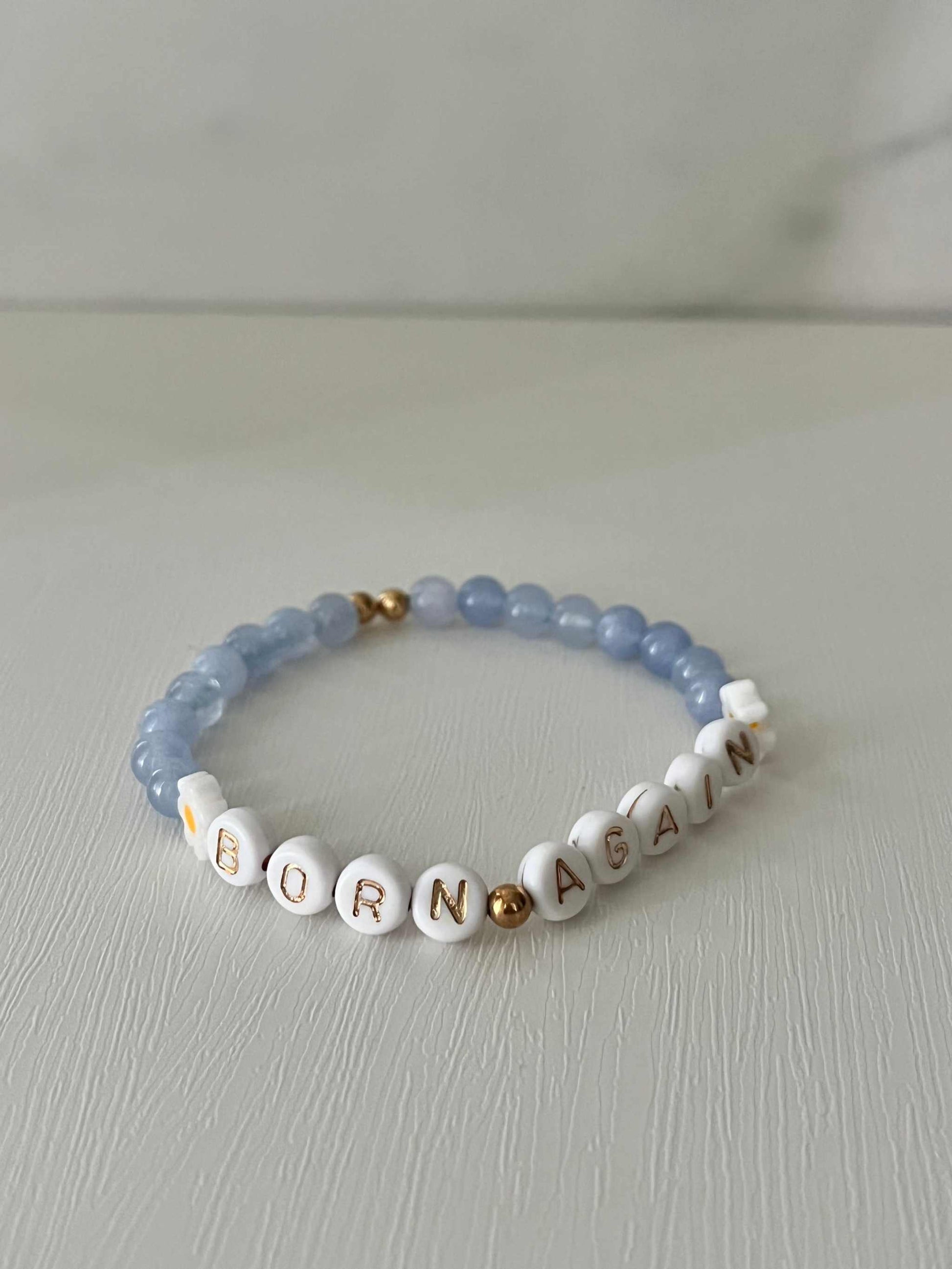 Sky Blue Born Again Bracelet showcasing vibrant blue beads, ideal for expressing faith and celebrating new beginnings in your spiritual journey.