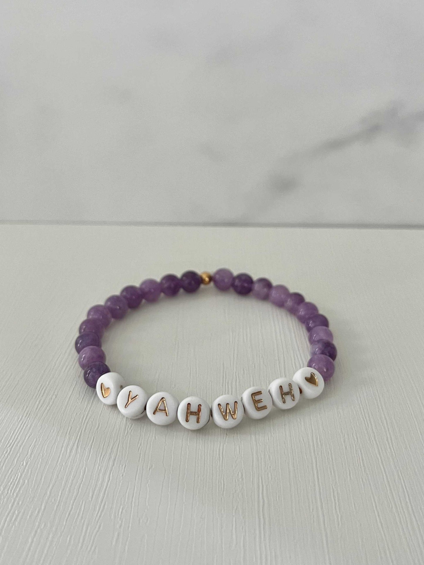 YAHWEH Pink Purple Marble Bracelet showcasing vibrant marble stones, ideal for expressing faith and adding a colorful touch to your jewelry collection.