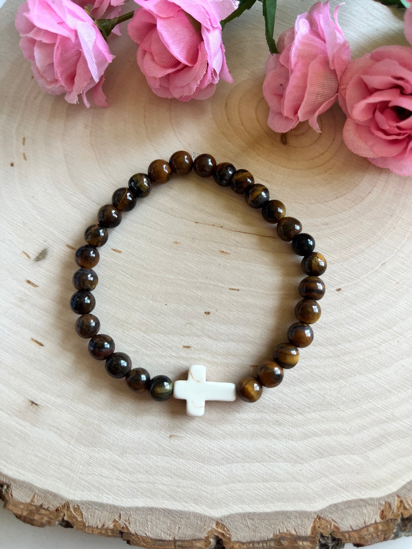 Tiger’s Eye cross bracelet with natural stone beads and faith-inspired design on stretch cord

