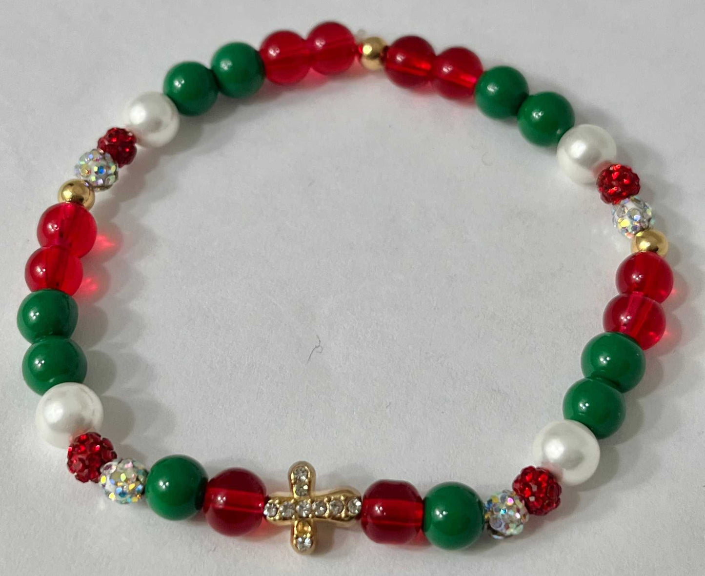 Jeweled Christmas Gold Cross bead bracelet – festive Christian holiday jewelry.

