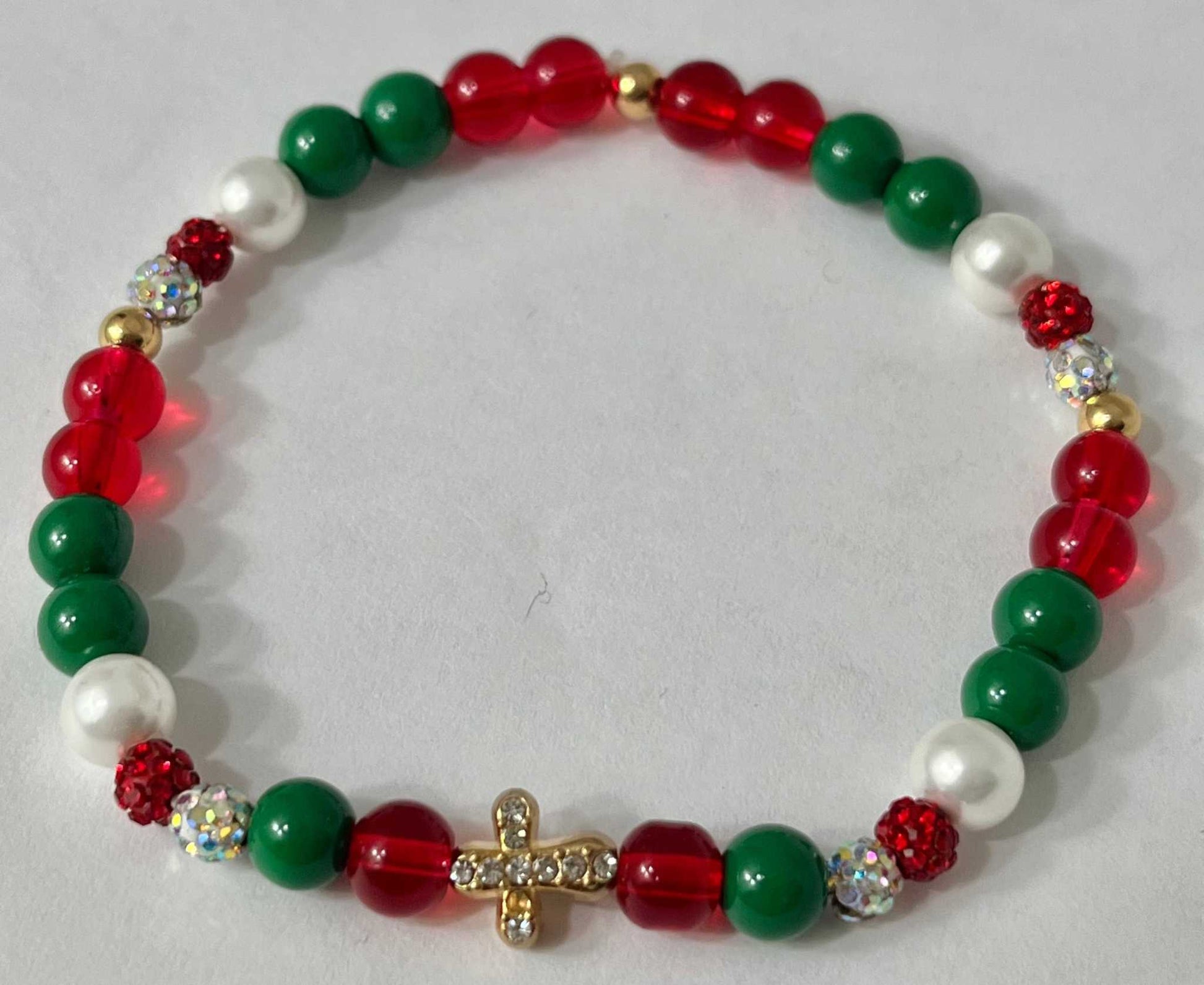 Jeweled Christmas Gold Cross bead bracelet – festive Christian holiday jewelry.

