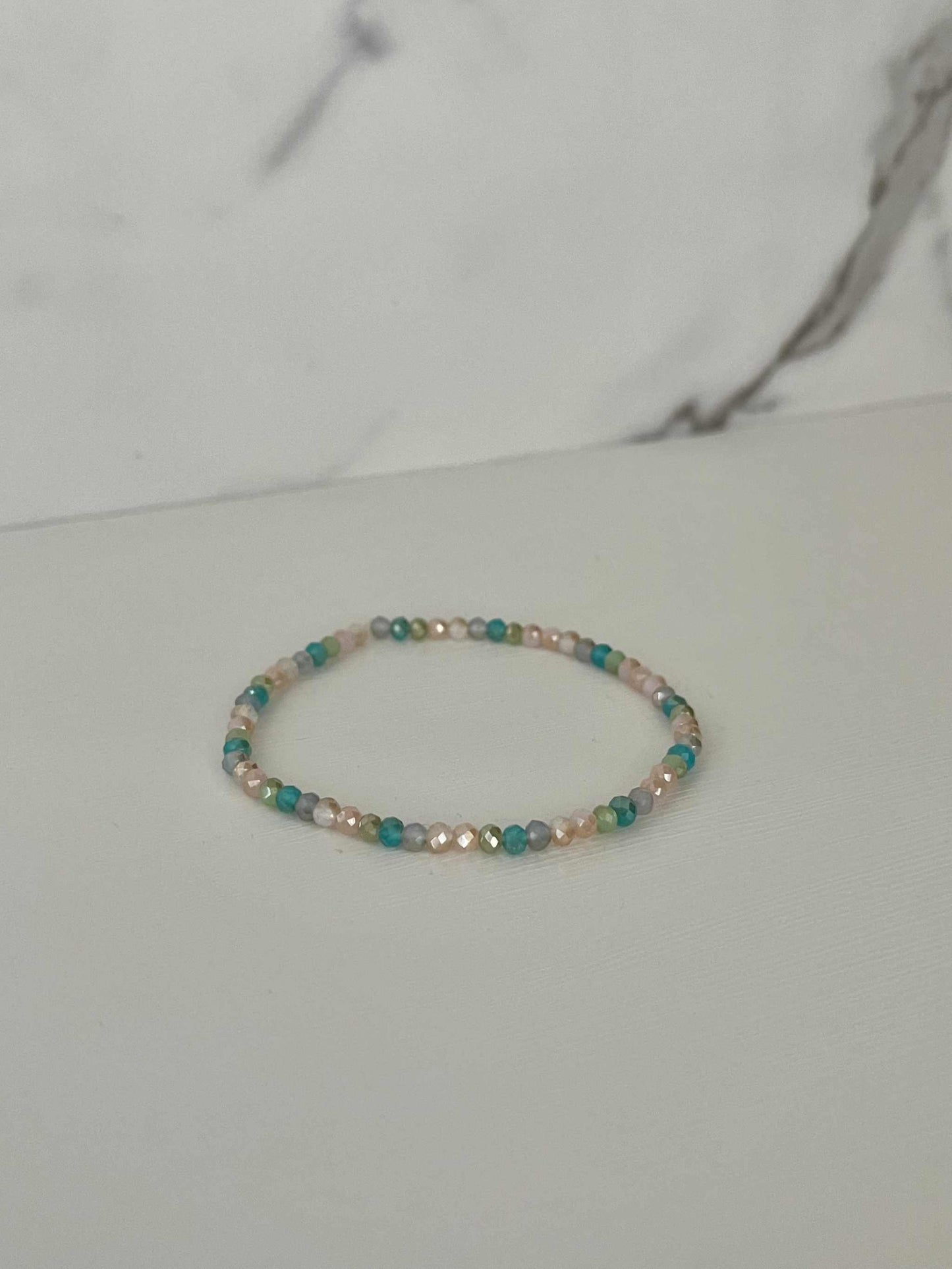 Multicolored jeweled beaded bMulticolor Jeweled Beaded Bracelet featuring vibrant beads, perfect for adding a colorful touch to your jewelry collection.racelet