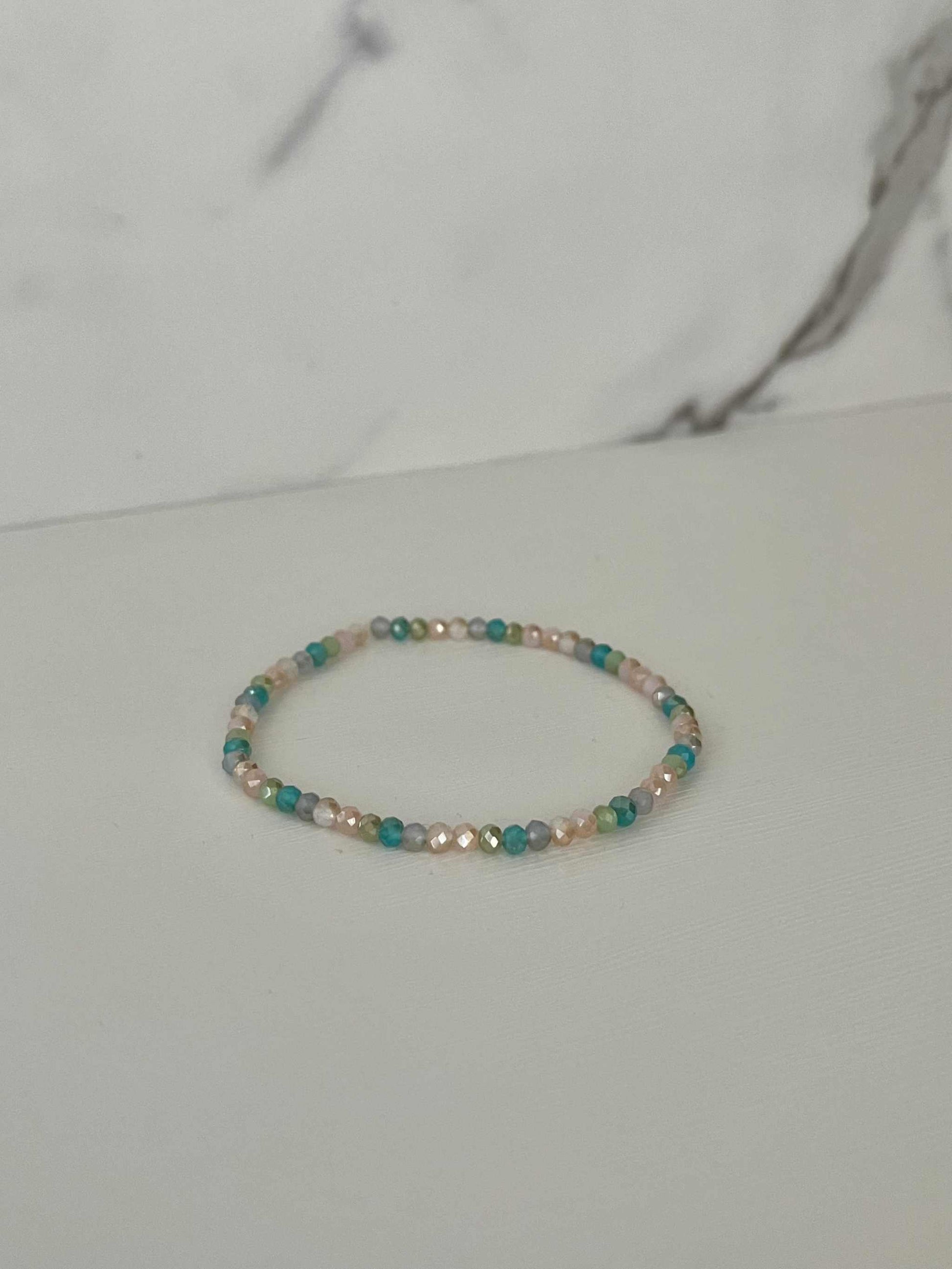 Multicolored jeweled beaded bMulticolor Jeweled Beaded Bracelet featuring vibrant beads, perfect for adding a colorful touch to your jewelry collection.racelet