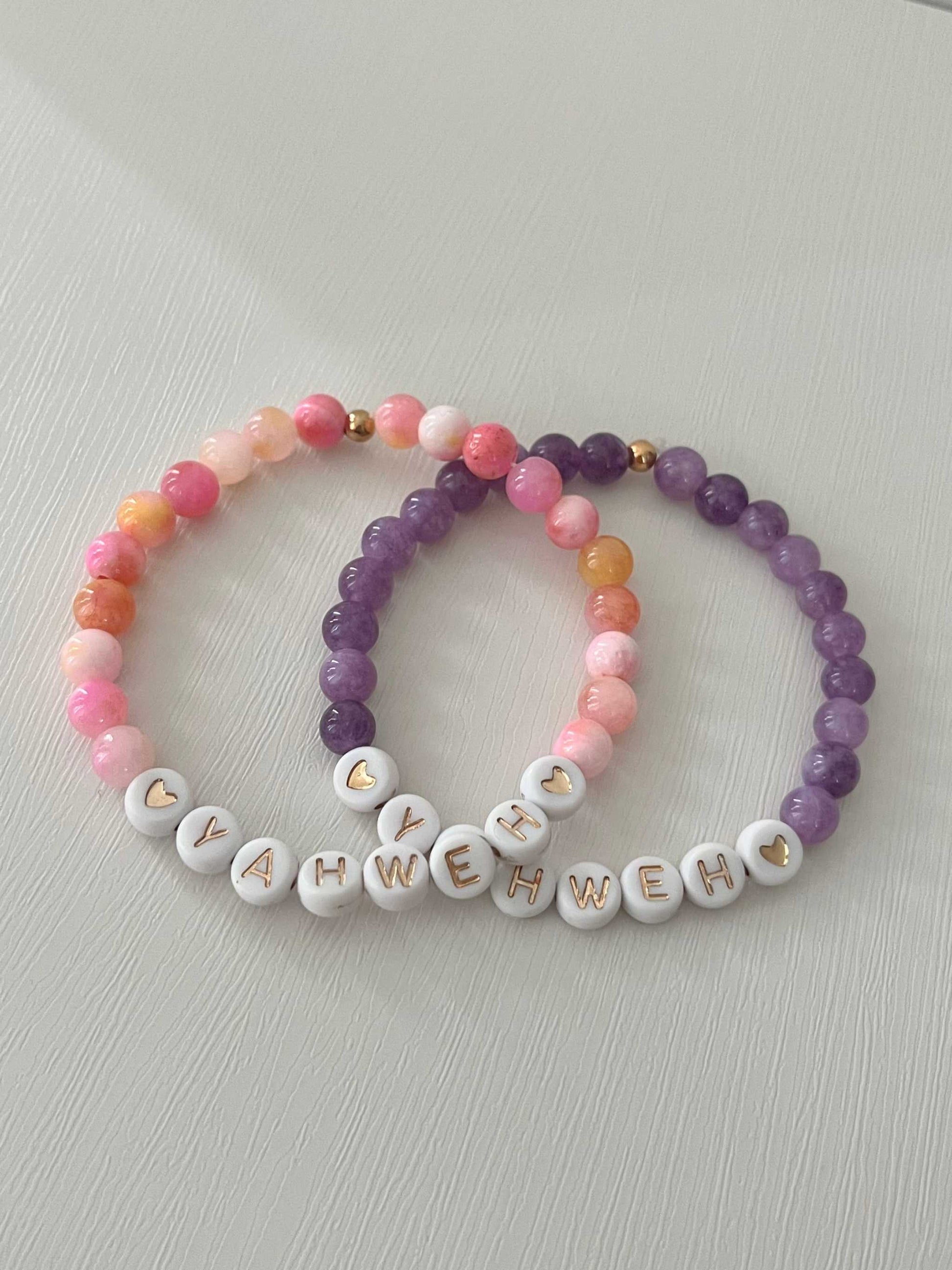 YAHWEH Pink Purple Marble Bracelet showcasing vibrant marble stones, ideal for expressing faith and adding a colorful touch to your jewelry collection.