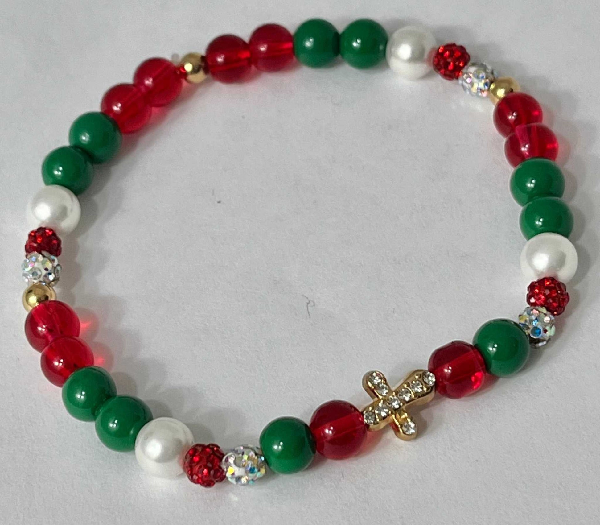 Jeweled Christmas Gold Cross bead bracelet – festive Christian holiday jewelry.

